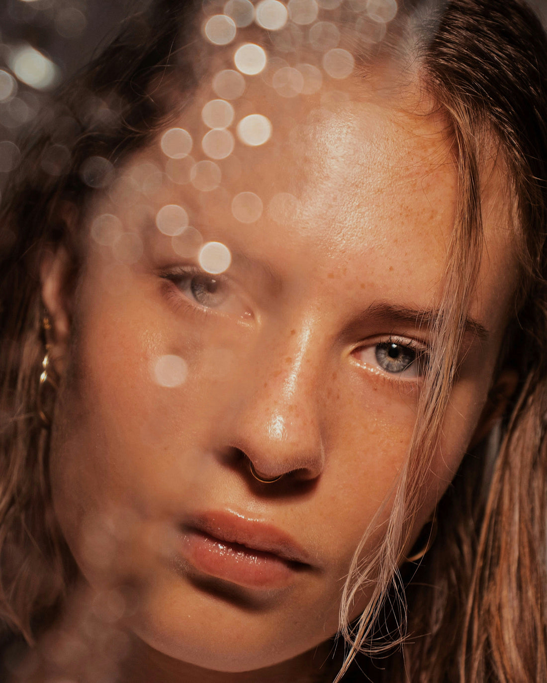 Woman with radiant, glowing skin – use peptide-rich skincare to boost collagen, smooth fine lines, and improve hydration