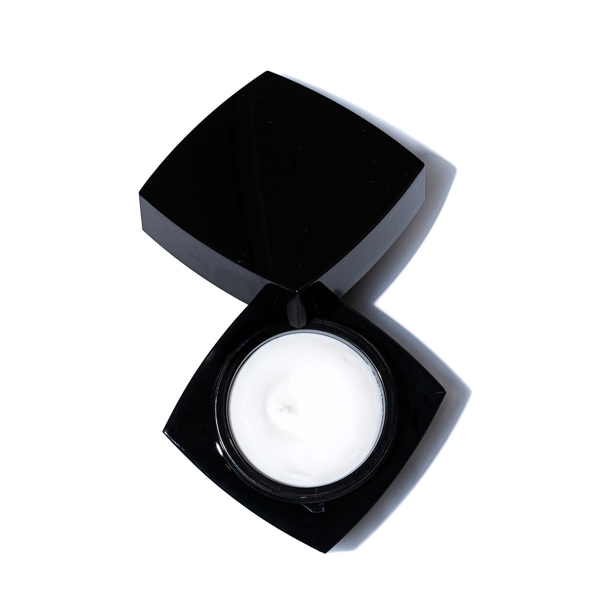 Revision Skincare Firming Night Treatment, a rich overnight cream that hydrates, firms, and smooths skin while you sleep.