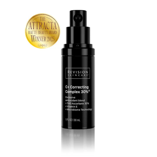 The best vitamin c for skin in a black skincare bottle with 'Revision Skincare' label and 'C+ Correcting Complex 30%' text, featuring an award badge on a white background.