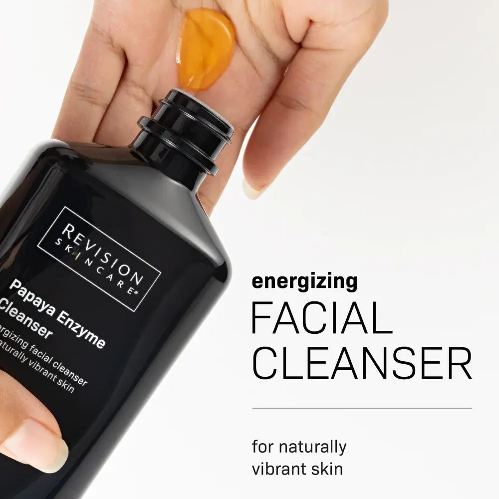 Revision Skincare Papaya Enzyme Cleanser gel on hand demonstrating gentle enzyme exfoliating face wash.