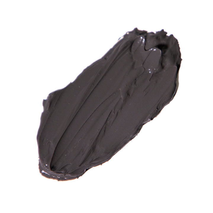 Texture smear of Revision Skincare Pore Purifying Clay Mask showing its rich, smooth gray formula for deep pore cleansing and skin refining.